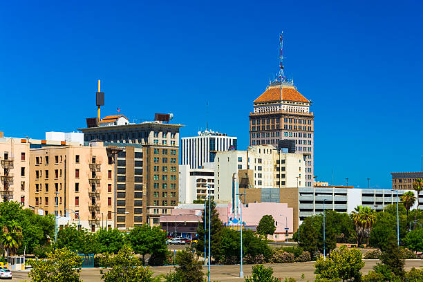 Fresno downtown skyline view with a clear blue sky in the background.